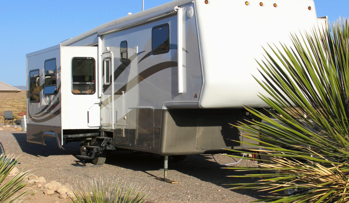 fifth wheel parked beside a Florida beach